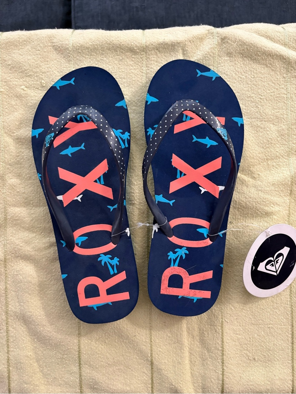 Roxy Women’s Navy Flip-Flops with Coral Logo and Turquoise Shark Print